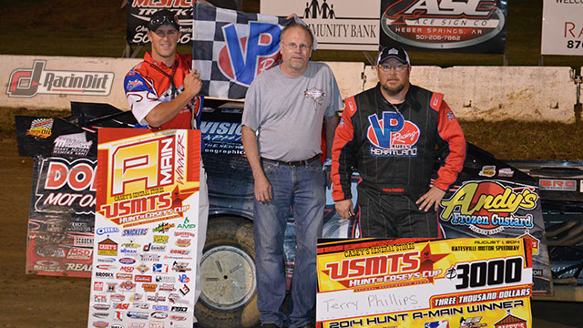 Terry Phillips (right) in victory lane with USMTS flagman Ryne Staley (left) and GRT Race Cars owner Joe Garrison after winning the 35-lap main event on Friday, Aug. 1, at the Batesville Motor Speedway.