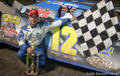 Hughes kicks off Dozen Days of Dirt with victory at Des Moines 