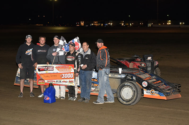 Rodney Sanders in victory with family and crew members on Friday, March 4, 2016, during USMTS Winter Speedweeks at the Southern Oklahoma Speedway in Ardmore, Okla. (Buck Monson Photo)
