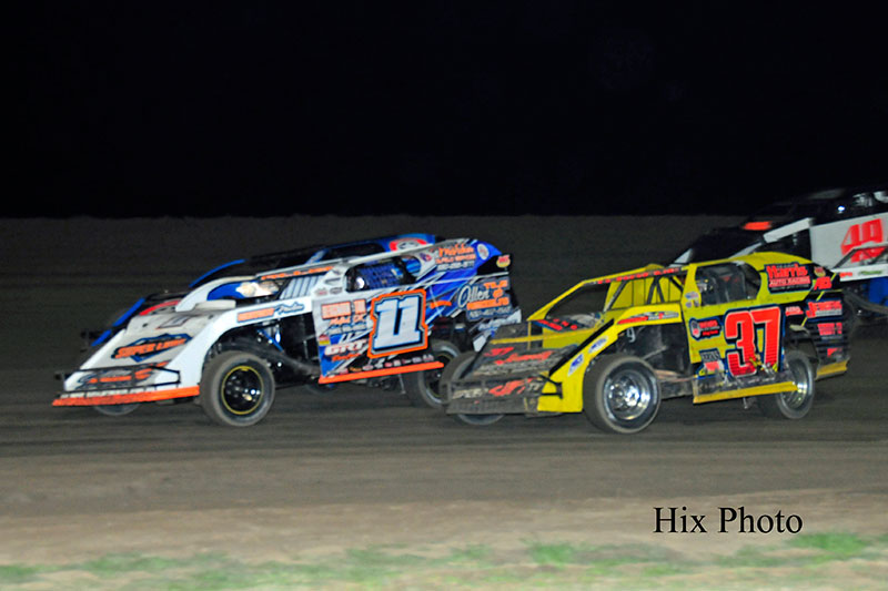 Dustin Allen (11), Mike Jergens (37) and Chase Allen (49) during USMTS Winter Speedweeks at the Southern Oklahoma Speedway in Ardmore, Okla.
