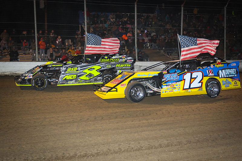 Jason Hughes (12) and Kyle Strickler (8) sat on the front row for the start of the main event on the final night of King of America VI presented by Chix Gear. (Cody Papke Photo)