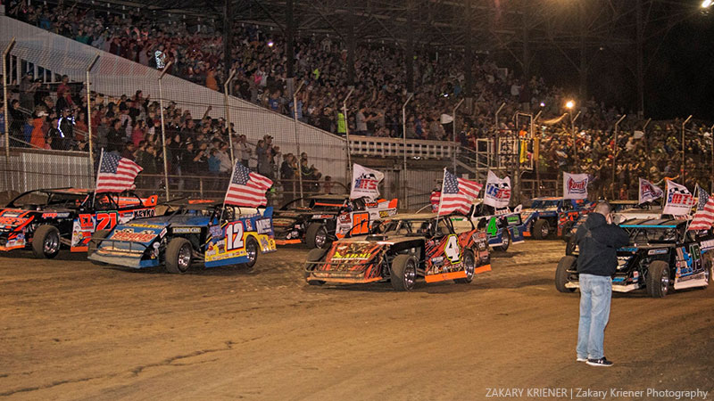 From left to right: Jacob Bleess, Jason Hughes, Tyler Wolff and Dustin Sorensen fill the front row for the main event parade lap in front of a packed house at the 10th Annual USMTS Nordic Nationals at the Upper Iowa Speedway in Decorah, Iowa, on Sunday, May 28, 2017.