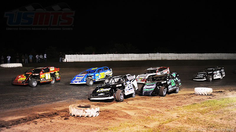 Mike Densberger (81), R.C. Whitwell (96), Al Purkey (30), Zack VanderBeek (33z) and Cade Dillard (97) race for the lead during the main event at the 3rd Annual USMTS Southern Kansas Nationals at the Caney Valley Speedway in Caney, Kan., on Tuesday, June 6, 2017.