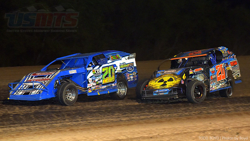 Current Gressel Racing driver Tanner Mullens leads former Gressel Racing driver Ricky Thornton Jr. during the feature race at the inaugural USMTS event at the Salina Speedway in Salina, Kan., on Thursday, June 8, 2017.