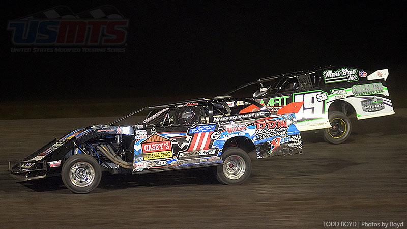 Pat Graham (inside) battles with Lance Mari in the feature race at the 7th Annual USMTS Malvern Bank Duals at the Adams County Speedway in Corning, Iowa, on Saturday, June 10, 2017.