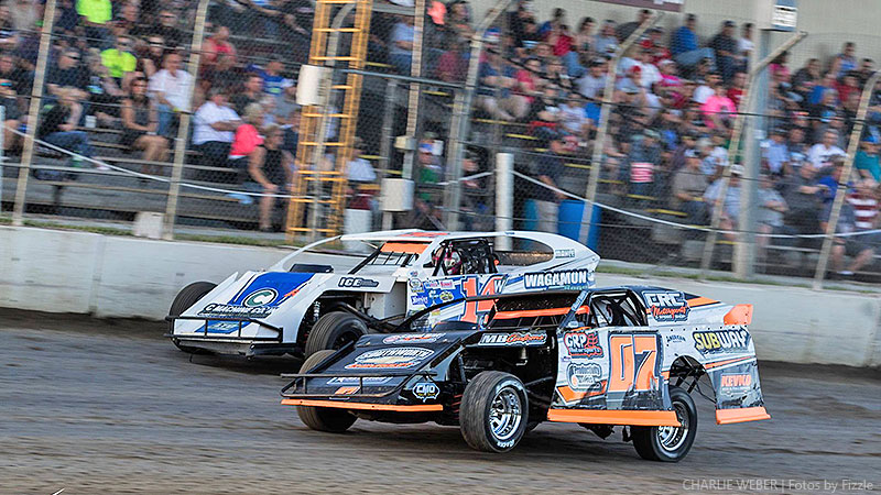 Cory Crapser (inside) and Clayton Wagamon at the 2nd Annual USMTS Chubbs Performance Midweek Modified Madness at the Ogilvie Raceway in Ogilvie, Minn., on Wednesday, June 14, 2017.