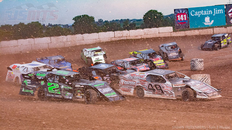 Stormy Scott (2s) battles Jake Timm (49) during Round #2 of the USMTS Badgerland Summer Shootout presented by Prestige Custom Cabinetry at the 141 Speedway in Francis Creek, Wis., on Wednesday, July 12, 2017.