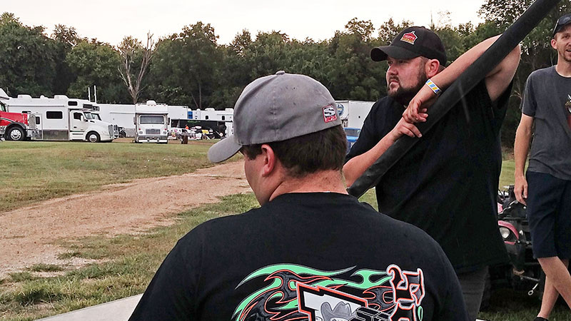 Stormy Scott and Zack VanderBeek survey the race track during the opening round of the USMTS Hunt for the Casey's Cup powered by S&S Fishing & Rental at the Springfield Raceway in Springfield, Mo., on Thursday, Aug. 3, 2017. It was Scott's first night out in a new VanderBuilt Race Car.