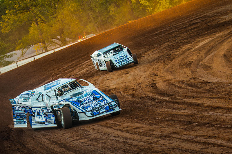 Logan Robertson (23) and Manuel Williams (24) during practice on Wednesday, April 10, at the Ark-La-Tex Speedway in Vivian, La., in preparation for the 7th Annual USMTS Cajun Clash on Thursday, Friday and Saturday, April 11-13.