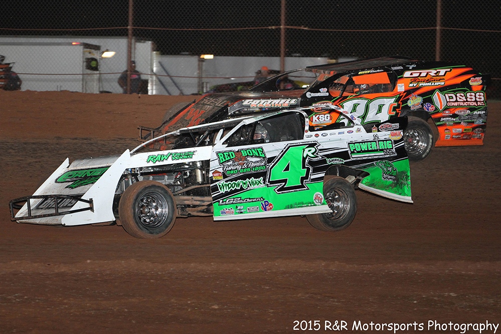 Dereck Ramirez (4r) and Steve Whiteaker Jr. (89) during the USMTS event on Saturday, June 27, 2015, at the Lawton Speedway in Lawton, Okla.