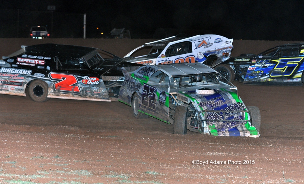 Trouble in the "A" Main between Grant Junghans (2), Daniel Hilsabeck (22d), Chase Allen (30) and Shane Sprinkle (5) during the USMTS event on Saturday, June 27, 2015, at the Lawton Speedway in Lawton, Okla.
