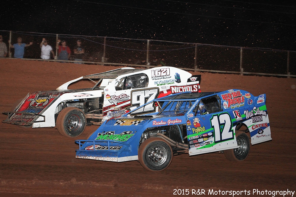 Jason Hughes (12) and Cade Dillard (97) during the USMTS event on Saturday, June 27, 2015, at the Lawton Speedway in Lawton, Okla.