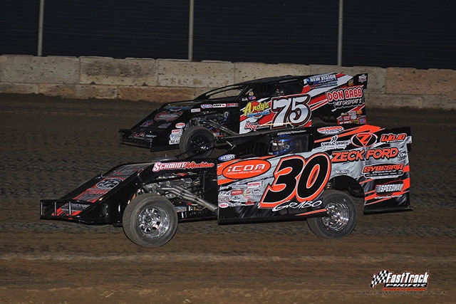 Jordan Grabouski (30) battles with teammate Terry Phillips in heat race action at the King of America III.