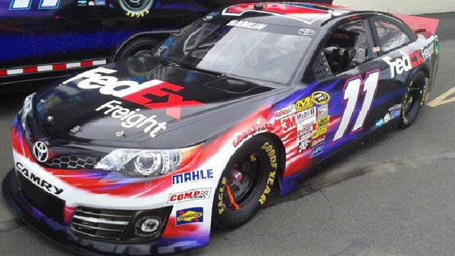 Denny Hamlin #11 machine on display at BP Labor Day Duel