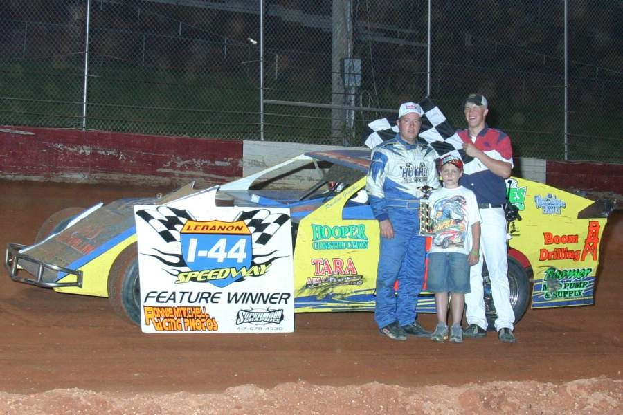 Jason Hughes stands in victory lane after winning the main event at the Lebanon I-44 Speedway on Saturday, June 16, 2007. (Photo credit: Ron Mitchell) 