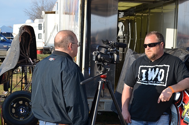 Terry Phillips does some face time with Kirk Elliott of The Racin' Boys.
