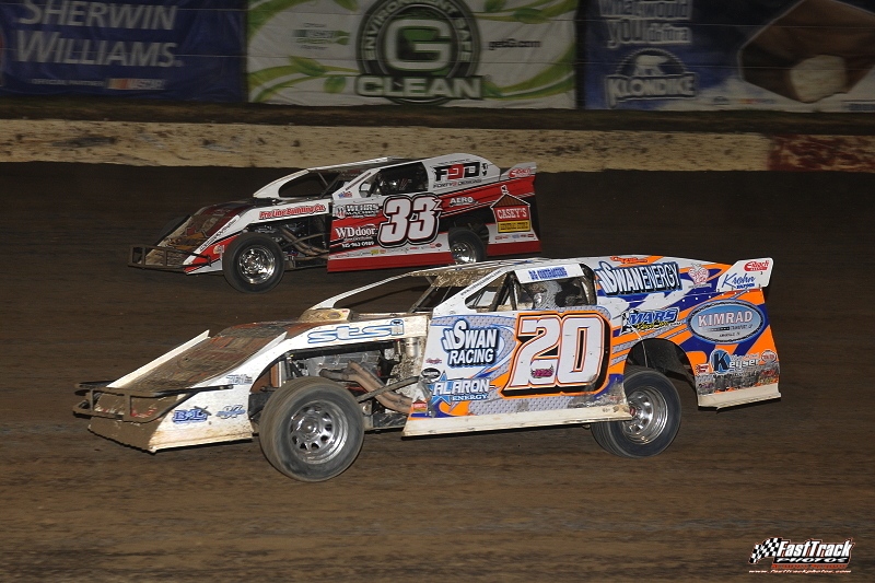 Feature race battle between Rodney Sanders (20) and Zack VanderBeek (33z) during the 3rd Annual Silver Dollar Nationals at the I-80 Speedway in Greenwood, Neb.