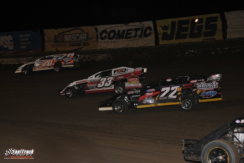 Three w0de at the I-80 Speedway during the Silver Dollar Nationals featuring Rodney Sanders (20), Zack VanderBeek (33z) and Rick Beebe (22b).