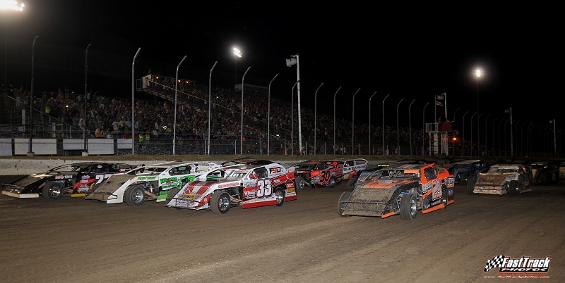Parade lap during the 3rd Annual Silver Dollar Nationals at the I-80 Speedway in Greenwood, Neb., showing Brad Dierks (29), Zack VanderBeek (33z), Johnny Scott (1st), Rick Beebe (22b), Jordan Grabouski (30) and others.