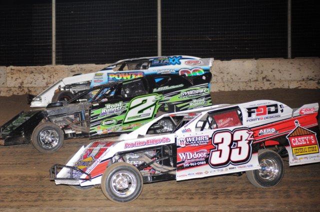 Zack VanderBeek (33z) works the inside line while Stormy Scott (2s) uses the middle and Jeff Conner (36) takes the high road at the Humboldt Speedway. (John Lee Photo)