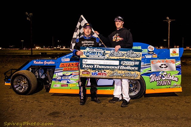 Jason Hughes posed with the check and the trophy, but was later disqualified during post-race technical inspections at the Thunderbird Speedway in Muskogee, Okla. (Mike Spivey Photo)